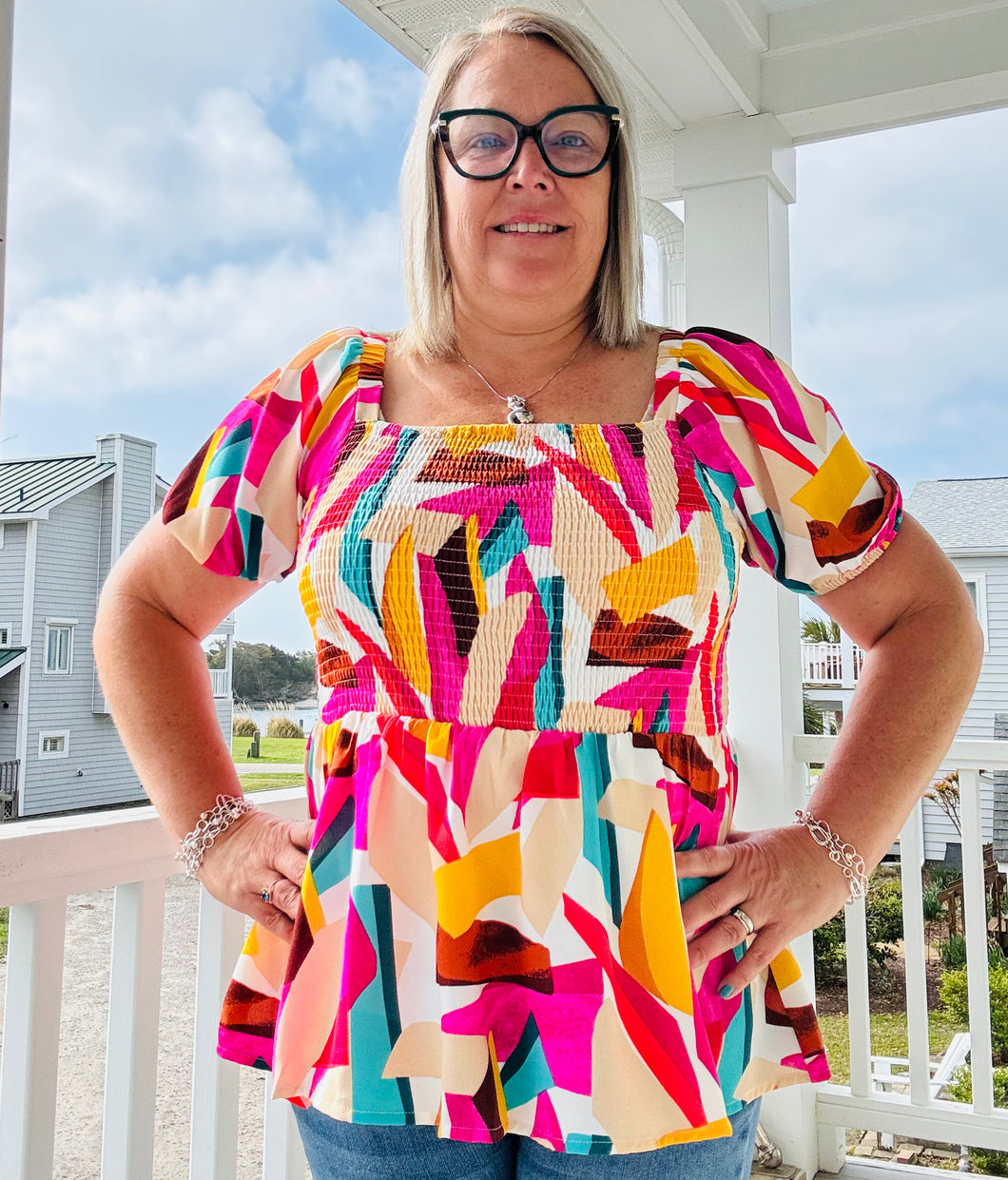 Smocked Print peplum bubble sleeves top